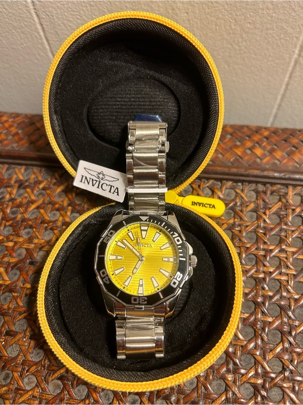 Invicta Men’s Stainless Steel Watch with Yellow Dial and Black Bezel